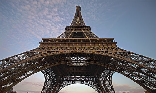 Photo "Eiffel Tower_Wide-1" by Flickr user gckwolfe, Creative Commons Flickr user under 2.0 Generic (CC BY 2.0) license.