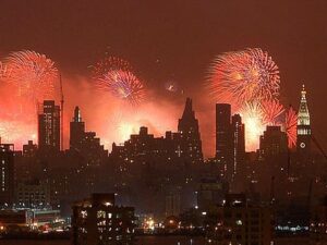 Cityscape with fireworks filling the sky