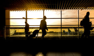 people walking through airport