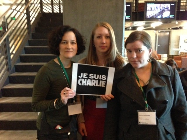 Reynolds Week fellows Janine Weisman (left), Molly Dill and Lauren Ohnesorge posted their sign on Twitter. 