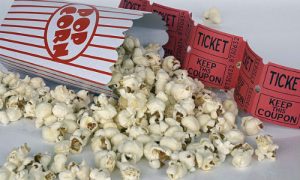 Movie theaters are combatting sinking sales with luxury service and immersive experiences. ("Popcorn" image by "annca" via Pixabay)