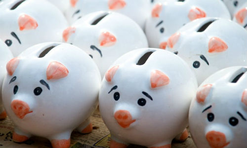 Many Americans make savings one of their New Year's resolutions. This data should jump-start a business story. ("Attack of the Piggy banks" image by "Low Jianwei" via flickr, CC B Y 2.0)