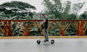 adult on a scooter