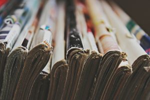 A collection of trade journals with worn spines