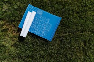 Blueprint on a Grassy Ground
