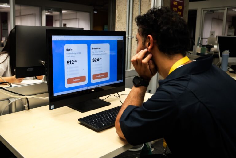 Student looking at subscription options on a computer