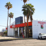 Tricolor building with empty parking lot