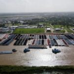 Aerial view of industrial site on river