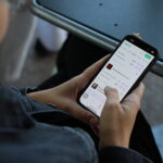 close up of person using smart phone