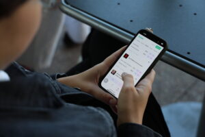 close up of person using smart phone